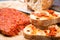 Spicy Italian Nduja Calabrian sausage served with rustic home ba