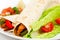 Spicy mexican fajita wraps on a white background