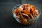 Spicy Paphia textile, or known as retak seribu lala fried with chillies. Served in a bowl. selective focus