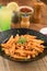 Spicy penne pasta with mint lemonade