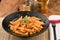 Spicy penne pasta with pepper