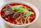 Spicy red soup beef noodle