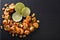 Spicy sauteed of shrimp, peanuts, lime and herbs closeup. horizontal top view