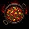 Spicy seafood soup in a pot on a dark background