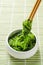 Spicy Seaweed Salad with chopsticks on bamboo background