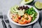 Spicy Shrimp Burrito Buddha Bowl with wild rice, broccoli, black beans and avocado