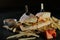 Spicy Southwest Chicken Sandwich with fries and mayonnaise dip served in tray isolated on dark background side view of breakfast