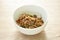 spicy stir fried bamboo shoot and chop beef meat with basil leaf in bowl