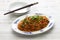 Spicy stir fry vermicelli with minced pork, classic Sichuan dish in chinese cuisine