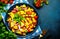 Spicy summer salad with sweet corn, red beans, avocado, jalapeno, red tomatoes, onion and fresh cilantro. Blue table background,