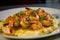 Spicy and Tangy Shrimp and Grits with a Jalapeno Kick