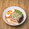 Spicy Tom Yum, Creamy Pork Ramen with Egg, Sugar Pea, Tofu and M