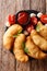 Spicy typical street Italian food: fried panzerotti with tomato