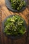 Spicy wakame salad on wooden background