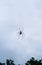 Spider sitting on the web with sky background for the wallpaper. Spider making a web. Spider webs with spiders are hanging in the