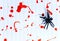 Spiders on a white background covered with blood, Halloween.
