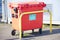 Spill kit yellow wheelie bin for health and safety of chemical, oil, diesel or petrol pollution leak