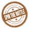 SPIN THE BOTTLE text on brown round grungy stamp