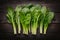 Spinach arranged on kitchen table, fresh and nutritious greens