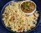 Spinach lentil curry served with sindhi Pulao