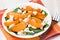 Spinach persimmon goat cheese salad