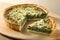 Spinach Quiche On A White Background. Generative AI