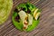 Spinach wrap with stir fry beef and vegetable on wood background