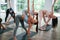 Spine and hands exercise. Group of women practicing fitness in the gym