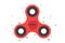 Spinner. A modern anti-stress toy in a flat style. A toy for hands and fingers. Red color. Multicolored pattern of symbols in the