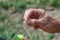 spinner with a triple hook for fishing in the hand. Nature