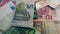 Spinning Euro banknotes and medicines. COVID-19 pandemia, economic crisis