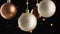 Spinning Glittering Christmas Ornament on Black Festive Backdrop.