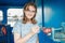 Spinning mechanism in women`s hands. The girl in the cabin of a steam locomotive. Vintage mechanisms inside the old train. Female