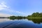 Spinning with reel on evening lake background