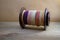 Spinning wheel bobbin filled with handspun yarn made of sheepâ€™s wool