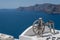 Spinning wheel over ocean on Santorini