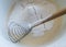 Spiral culinary whisk for whipping. beaten eggs with flour and sugar