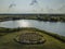 Spiral labyrinth made of stones on the lake, aerial view