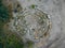 Spiral labyrinth made of stones, top view from drone