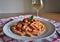 Spiral pasta fusilli with tuna fish, tomato sauce, olive oil and basil.