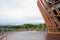 Spiral planked walkway with glass railings of viewing platform of Danjing Mountain