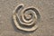 Spiral sign in sand