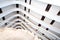 A spiral staircase and white balconies