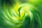 Spiral vortex green blurred gradient background