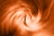 Spiral vortex orange blurred gradient background texture