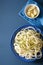 Spiralized courgette raw vegetable noodles on plate