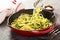 Spiralized zucchini noodles in a cast iron pan