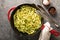 Spiralized zucchini noodles in a cast iron pan