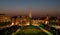 The spire of Brussels Town Hall on Grand Place is seen on the horizon, photographed from above the Mont des Arts park