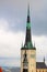 The spire of the church of Oleviste St. Olaf close up on a cloudy day, Tallinn